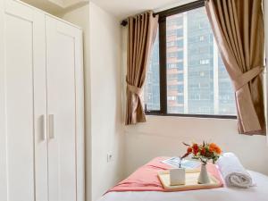 Well Furnished and Comfort 2BR Meikarta Apartment By Travelio