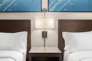 Two Room Suite with Two Double Beds and Sofa Bed room in Homewood Suites by Hilton Downers Grove Chicago