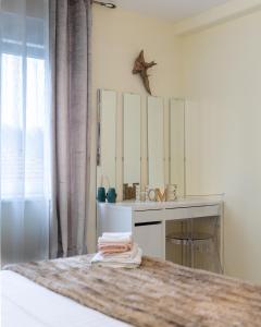 Appartements La Bonbonniere by Leslodgespa : photos des chambres