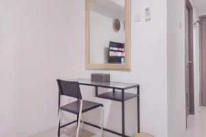 Good and Comfortable 1BR at Tamansari Bintaro Mansion Apartment By Travelio
