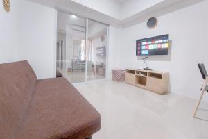 Good and Comfortable 1BR at Tamansari Bintaro Mansion Apartment By Travelio
