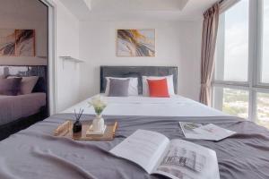 Good and Comfortable 1BR at Tamansari Bintaro Mansion Apartment By Travelio