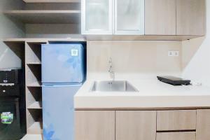 Comfort Living 1BR without Living Room at Bintaro Embarcadero Apartment By Travelio