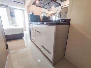 Simple and Restful Studio at Tanglin Supermall Mansion Apartment By Travelio