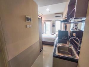 Simple and Restful Studio at Tanglin Supermall Mansion Apartment By Travelio