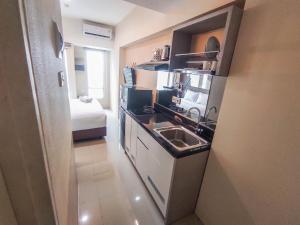 Simple and Restful Studio at Tanglin Supermall Mansion Apartment By Travelio