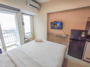 Simple and Restful Studio at Tanglin Supermall Mansion Apartment By Travelio