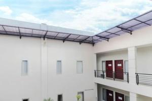 RedDoorz Plus Syariah at Polamas Andalas