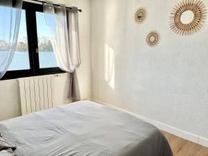 Appartements Le bassin - Vue canal du midi avec climatisation et garage : photos des chambres