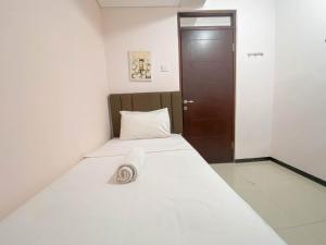 Spacious and Minimalist 3BR at Gateway Pasteur Apartment By Travelio