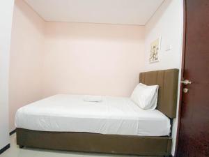 Spacious and Minimalist 3BR at Gateway Pasteur Apartment By Travelio