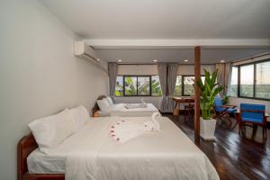 Pomelo Travel Outpost Cambodia ដំណាក់ភ្នំក្រោម