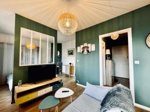 Appartements L ESCALE, grand studio pres de la gare : photos des chambres