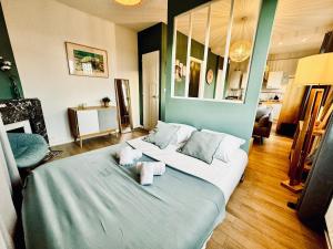 Appartements L ESCALE, grand studio pres de la gare : photos des chambres