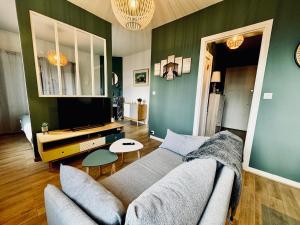 Appartements L ESCALE, grand studio pres de la gare : photos des chambres