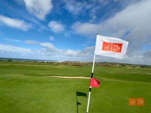 Maisons de vacances Au Ptit Bouchon Villa Golf : photos des chambres