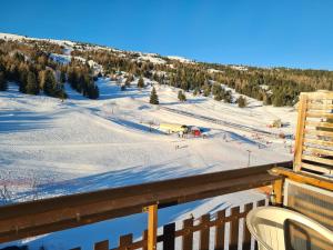 Appartements L- Eclat des Sommets en face et aux pieds des pistes : photos des chambres