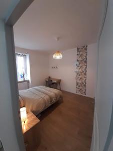 Appartements T2 Spacieux et Confortable : photos des chambres