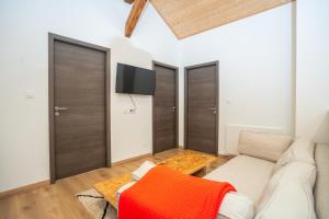 Appartements Le Perchoir du Grand Valtin - Gite 9 personnes - Altitude 830 : photos des chambres