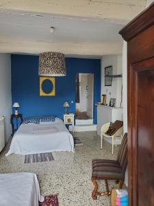 Appartements La Pause Bleue : photos des chambres