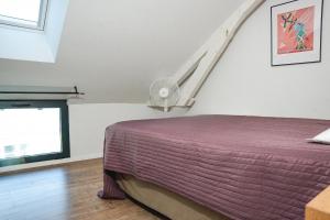 Maisons de vacances Coeur de village, maison pour 8 avec piscine : photos des chambres