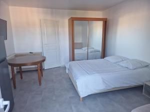 Appartements Joli studio : photos des chambres