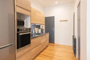 Appartements Studio Neuf : photos des chambres