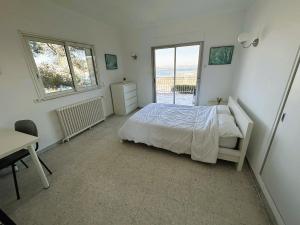 Appartements Haut de villa, pleine vue mer : photos des chambres