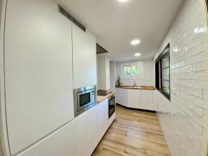 The Cozy House by Kura Homes