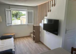Appartements Maison climatisee - piscine & parking inclus : photos des chambres