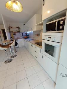 Appartements Grand T2 avec terrasse : photos des chambres