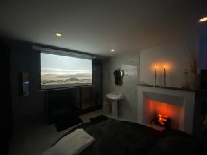 Appartements Le Cadre Noir Lux Spa, Sauna, Jacuzzi, Hammam : photos des chambres