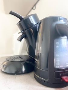 Appartements Studio Clara - proche gare et aeroport, balcon : photos des chambres