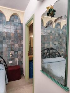 Lilybaitan, risacca e albaria