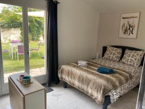 Maisons de vacances Bas de villa composee d-un 3 pieces et d-un studio avec piscine privee : photos des chambres