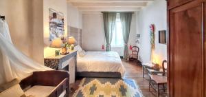 Maisons de vacances Maison charmante a Mauzun avec jardin et patio fleuri : photos des chambres