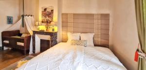 Maisons de vacances Maison charmante a Mauzun avec jardin et patio fleuri : photos des chambres