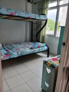 MANOA "Lugar de descanso" HABITACION CON VISTA A LA CIUDAD, FRESCO Y VENTILADO