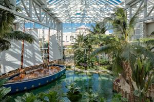 Queen Room with Two Queen Beds Atrium View - Water Park Access  room in Gaylord Palms Resort & Convention Center