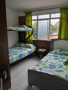 MANOA "Lugar de descanso" HABITACION CON VISTA A LA CIUDAD, FRESCO Y VENTILADO