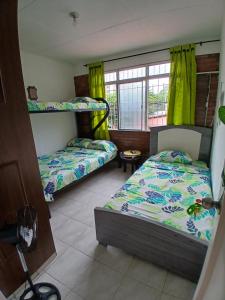 MANOA "Lugar de descanso" HABITACION CON VISTA A LA CIUDAD, FRESCO Y VENTILADO