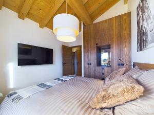 Appartements Appartement T4 dernier etage avec cheminee et parking proche pistes - FR-1-398-678 : photos des chambres