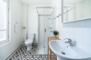 Appartements Residence Bains Callou situee face aux thermes : photos des chambres