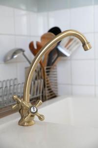 Appartements Residence Bains Callou situee face aux thermes : photos des chambres