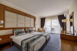 Scala Nuova Beach Hotel - 4hvězdičkové hotely ve městě Kuşadası