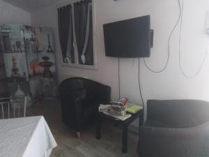 Appartements tiny house independante climatisee : photos des chambres