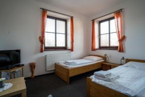 Twin Room with Extra Bed room in Penzion Fialka