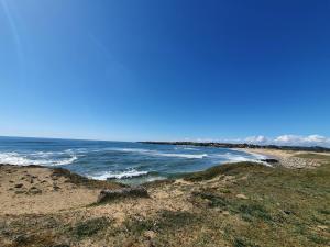 Duplex proche de la mer avec piscine