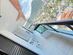 Pé na areia canto do forte V