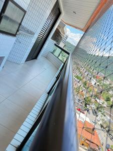 Pé na areia canto do forte V